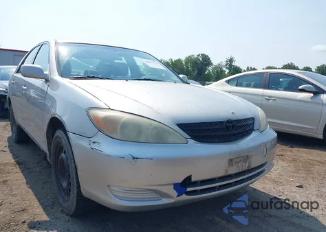2002 Toyota Camry Le from USA, damaged, VIN 4T1BE32K02U070616